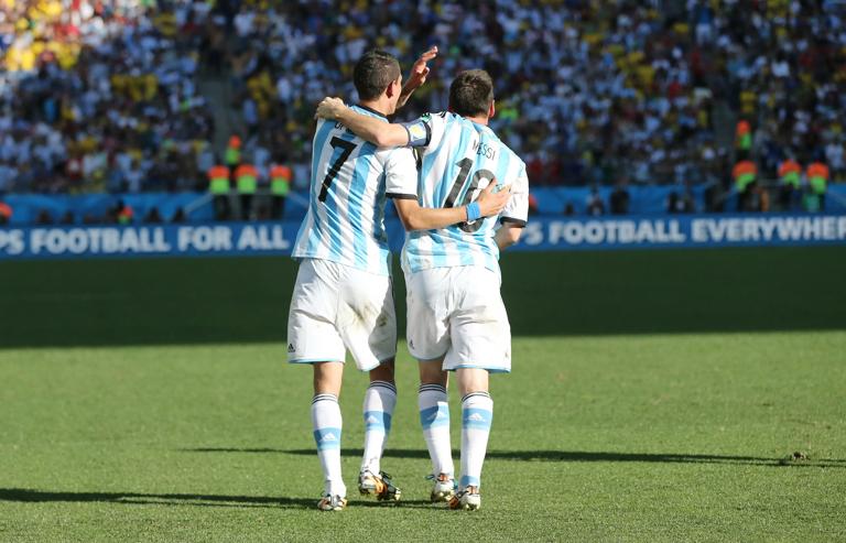 SAO PAULO, BRAZIL - JULY 01:  Angel Di Maria of Argentina celebrates scoring with Lionel Messi of Argentina during the 2014 FIFA World Cup Brazil Round of 16 match between Argentina and Switzerland at The Arena de Sao Paulo on July 01, 2014 in Sao Paulo, Brazil. (Photo by Ian MacNicol/Getty Images)