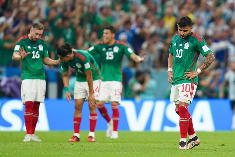 LUSAIL CITY, QATAR - NOVEMBER 26: Alexis Vega (R) of Mexico reacts during the FIFA World Cup Qatar 2022 Group C match between Argentina and Mexico at Lusail Stadium on November 26, 2022 in Lusail City, Qatar. (Photo by Khalil Bashar/Jam Media/Getty Images)
