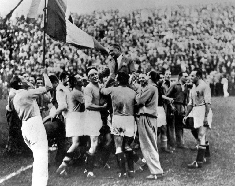 1934 World Cup Final, Rome, Italy, Italy 2 v Czechoslovakia 1, 10th June, 1934, The victorious Italian team carry their coach Vittorio Pozzo as they celebrate an historic victory  (Photo by Bob Thomas/Popperfoto via Getty Images/Getty Images)