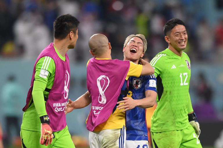 DOHA, QATAR - DECEMBER 01: (L-R) Eiji Kawashima, Daizen Maeda, Takuma Asano and Shuichi Gonda of Japan celebrate their 2-1 victory and qualification for the knockout stage after the FIFA World Cup Qatar 2022 Group E match between Japan and Spain at Khalifa International Stadium on December 01, 2022 in Doha, Qatar. (Photo by Stu Forster/Getty Images)