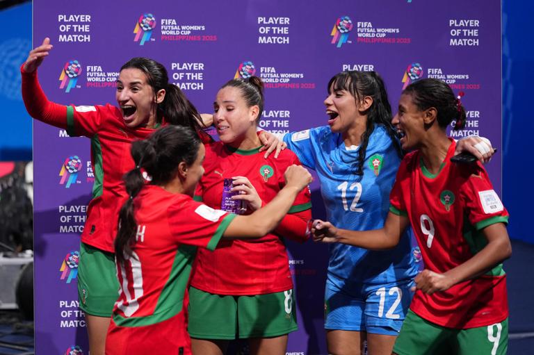 MANILA, PHILIPPINES - NOVEMBER 27: Meryem Hajri of Morocco celebrates with teammates after the team's victory in the FIFA Futsal Women's World Cup - Group A match between Poland and Morocco at PhilSports Arena on November 27, 2025 in Manila, Philippines. (Photo by Aitor Alcalde - FIFA/FIFA via Getty Images)