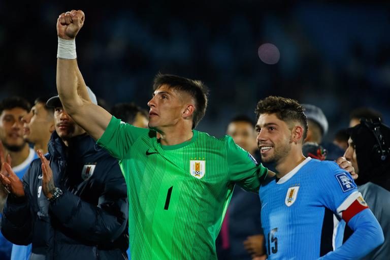 MONTEVIDEO, URUGUAY - SEPTEMBER 04: Sergio Rochet and Federico Valverde of Uruguay celebrate victory during the South American FIFA World Cup 2026 Qualifier match between Uruguay and Peru at Centenario Stadium on September 04, 2025 in Montevideo, Uruguay. (Photo by Ernesto Ryan/Getty Images)